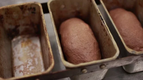 Chef puts the dough in a rectangular shape for baking bread 動画素材 211691776