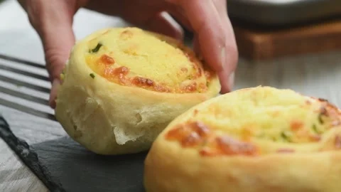 The chef puts the freshly prepared mozzarella green onion roll on the table. Stock Footage 197466533