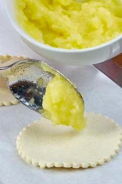 Chef puts jam on the dough cheesecakes with jam Complete Series Food recipe Stock Photos