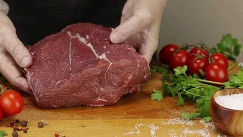Chef puts a large piece of beef pulp Stock Footage 122205456
