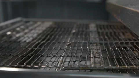 Chef puts pizza in the oven Stock Footage 134955278