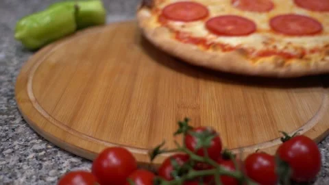 The chef puts pizza on the table Video stock 135313431