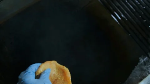 Chef puts raw meat on the grill. Stockbeeldmateriaal 120893870