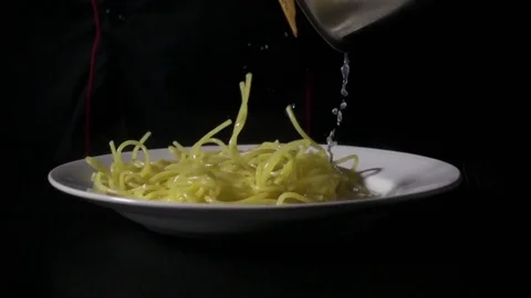 Chef puts spaghetti pasta slow mo Stock Footage 72432746