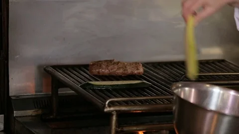 Chef puts vegetables to grill Video stock 74716112