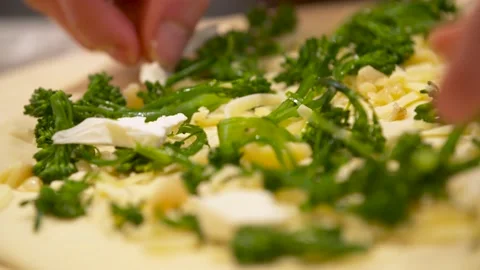 Chef putting cheese on vegetable pizza 4K Stock Footage 158036297