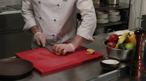 Chef putting diced potato into the plate Stock Footage 66060349