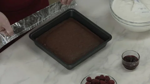 Chef Putting Foil around Baking Plate with Biscuit Stock Footage 164019117