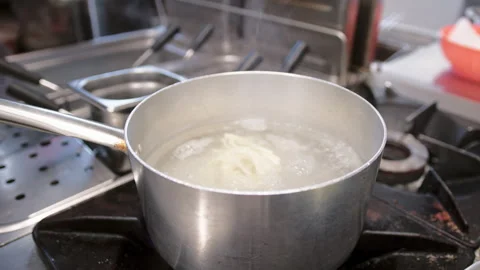 Chef Putting Pasta Inside Boiling Water Pot Stock Footage 301922697