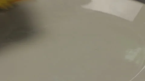 Chef putting sliced lemon into the plate, close up Stock-Footage 66061562