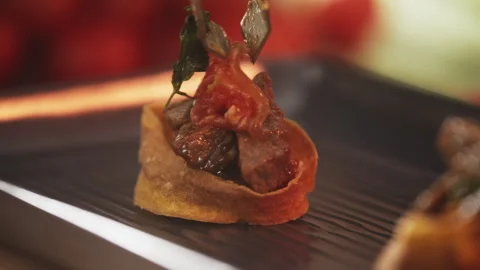 Chef putting a tomato on a fancy dish Stock Footage 274669308