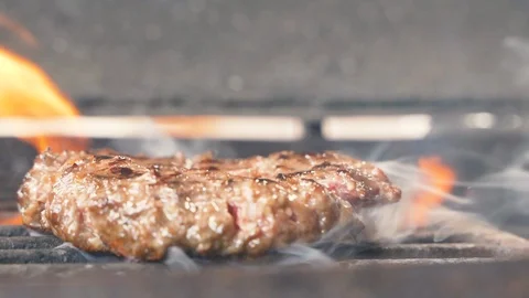 The chef removes beef or pork hamburger meatballs grilled on a barbecue grill Stock Footage 107531801