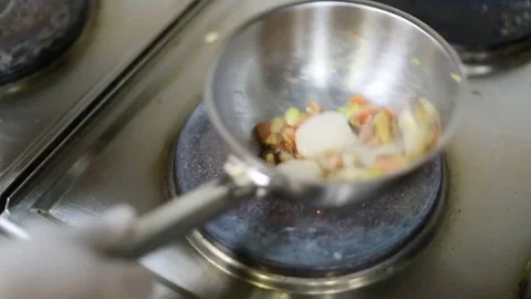 Chef In Restaurant Kitchen Cooking Stock Footage