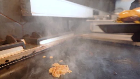 Chef in restaurant kitchen making burger. Fresh meat twisted into minced meat Stock Footage 262450505