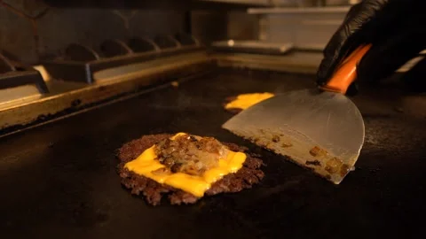 Chef in restaurant kitchen making burger. Fresh meat twisted into minced meat Stock Footage 262450694
