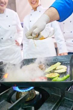 Chef in restaurant kitchen Stock Photos