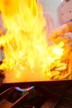 Chef in restaurant kitchen Stock Photos