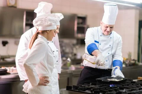 Chef in restaurant kitchen Stock Photos