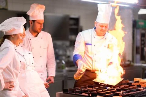 Chef in restaurant kitchen Stock Photos