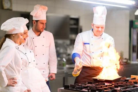 Chef in restaurant kitchen Stock Photos