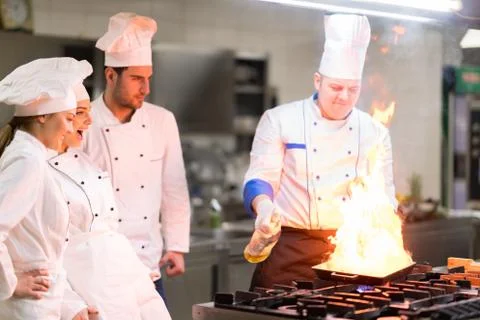 Chef in restaurant kitchen Stock Photos