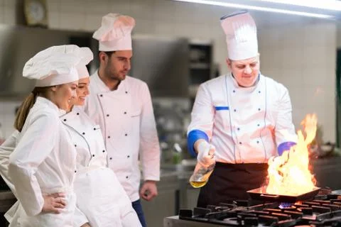Chef in restaurant kitchen Stock Photos