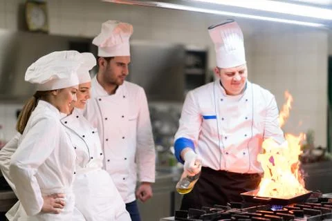 Chef in restaurant kitchen Stock Photos