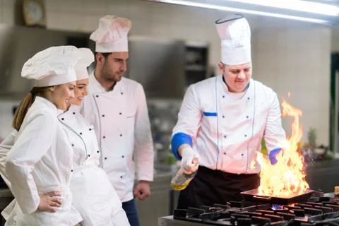 Chef in restaurant kitchen Stock Photos