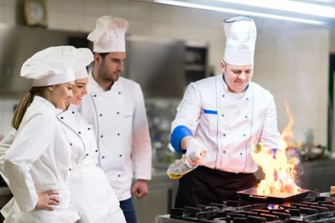 Chef in restaurant kitchen Stock Photos