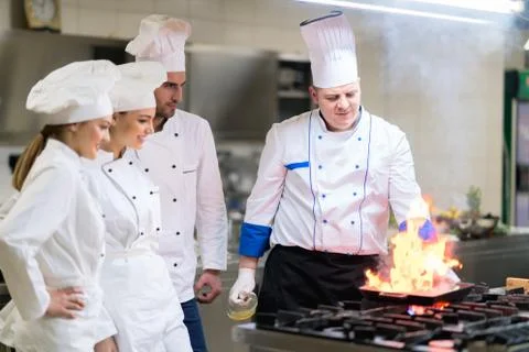 Chef in restaurant kitchen Stock Photos