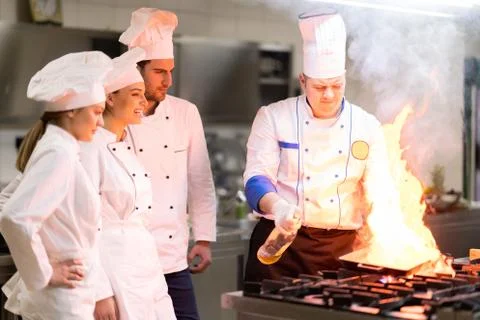 Chef in restaurant kitchen Stock Photos