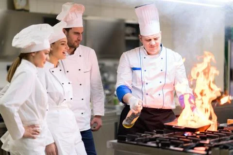 Chef in restaurant kitchen Stock Photos