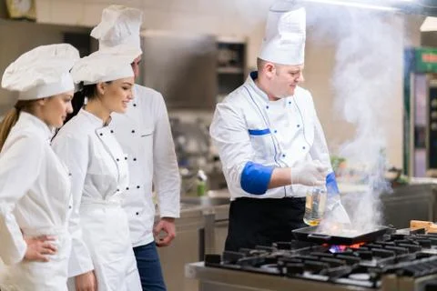 Chef in restaurant kitchen Stock Photos