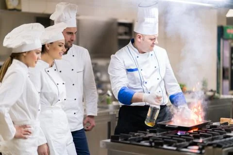 Chef in restaurant kitchen Stock Photos