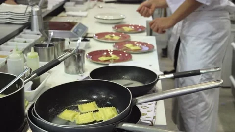 Chef of a Restaurant who is going to Plate the Freshly Cooked Italian Pasta Video stock 196791821
