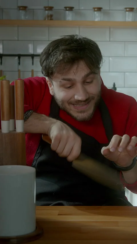 Chef reviewing a professional kitchen knife for a cooking tutorial, vertica.. 動画素材 303692468
