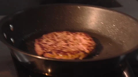 The chef roasts a cutlet for a burger Stock Footage 158021604