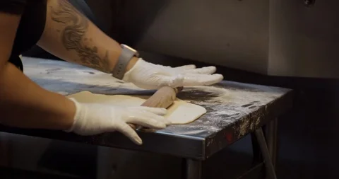 Chef Rolling Dough for Flatbread Stock Footage 129847082