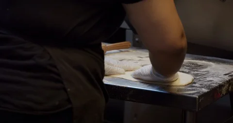 Chef Rolling Dough for Flatbread Video stock 129847138