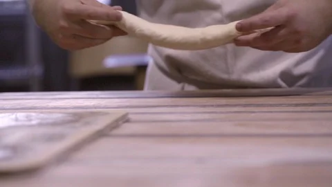 Chef rolling the dough Stock Footage 87700471