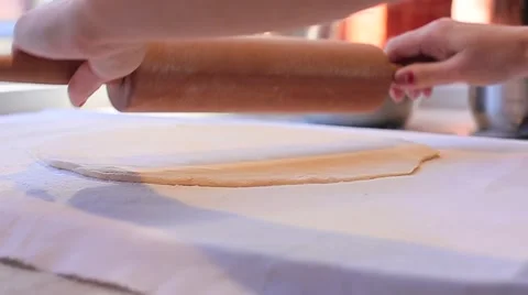Chef rolls the dough close up Stock Footage 64582637