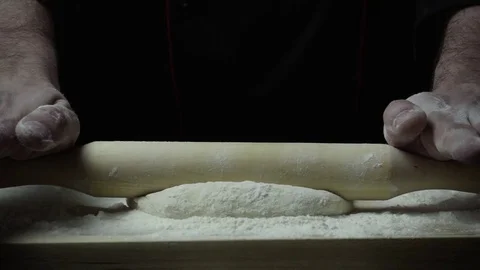 Chef rolls the dough super slow mo Stock Footage 72782278