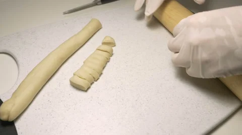 Chef rolls out the circle dough Stock Footage 63779425
