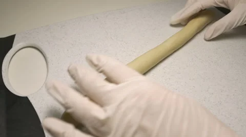 Chef rolls out the dough Stock Footage 63779439