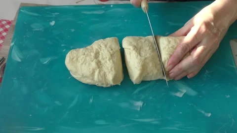 The chef rolls out the dough for the pie Stock Footage 183417607