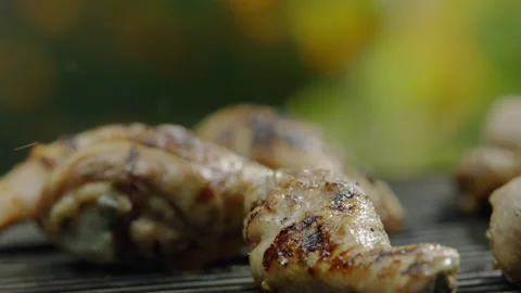 Chef Rotate Chicken Legs with Kitchen Tool Closeup Stock-Footage 145255442