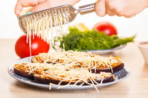 Chef is rubbing cheese Stock Photos