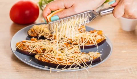 Chef is rubbing cheese Stock Photos