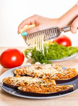 Chef is rubbing cheese Stock Photos