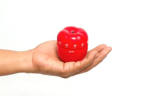 Chef 's hand with a apple timer Stock-Fotos